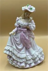 1 figurine en porcelaine avec boîte à musique - hauteur 19 cm