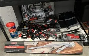 1 mitre saw and 1 large clamp assortment