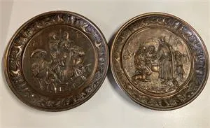 2 decorative wall plates made of a copper alloy in Renaissance style