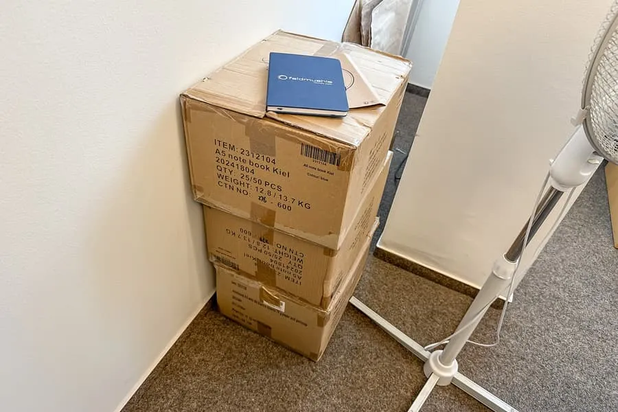 3 boxes of printed notebooks