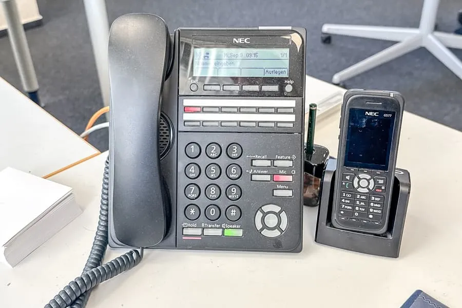 Cordless phone and system telephone Nec