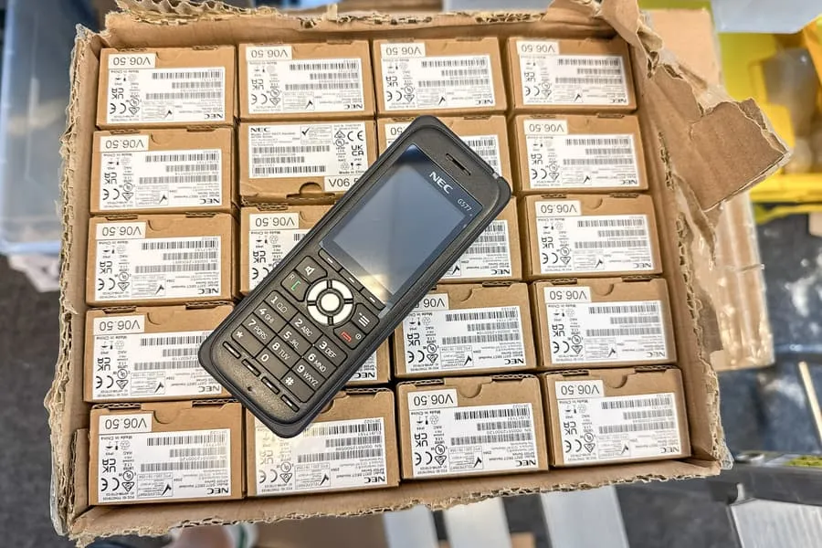 Box of cordless phones NEC G577